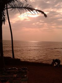 Scenic view of sea against sky at sunset