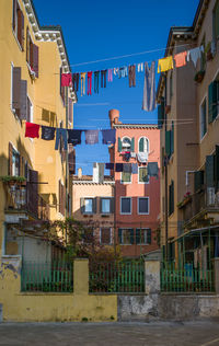 Multi colored houses against clear sky