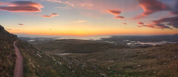 Scenic view of landscape against sky during sunset