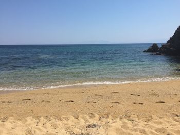 Scenic view of sea against clear sky