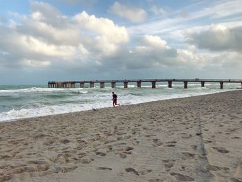 Scenic view of beach against sky