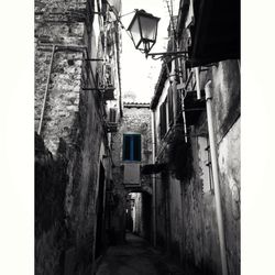 Narrow alley with buildings in background