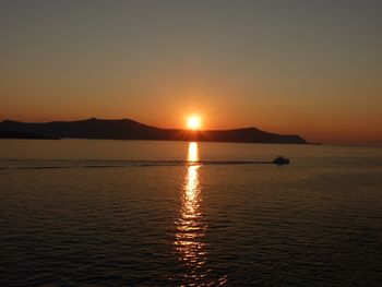 Scenic view of sunset over river