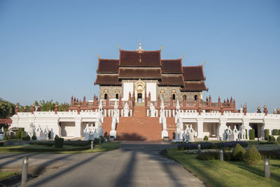 Facade of historic building against clear sky