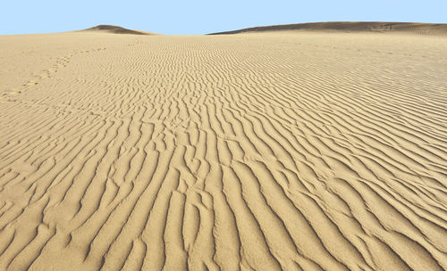 Sand dunes in desert