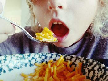 Close-up of baby eating food