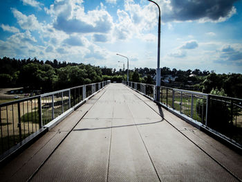 Empty road against sky