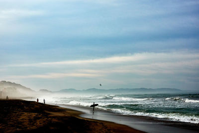 Scenic view of beach against sky