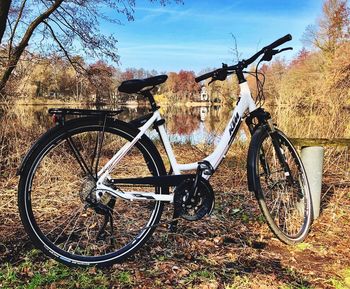 Bicycle parked on field