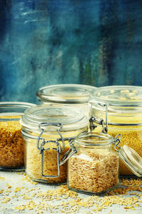 Close-up of glass jar on table