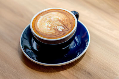 High angle view of coffee on table