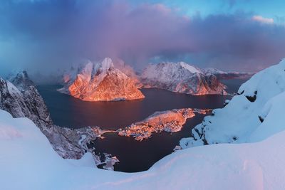 Panoramic view of snowcapped mountain against sky during winter