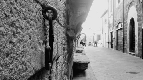 Close-up of old wall by building