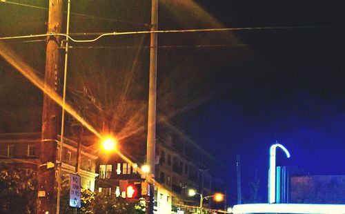 Low angle view of illuminated street light