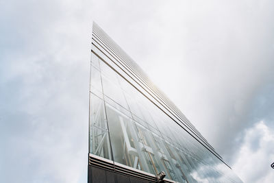 Low angle view of modern building against sky