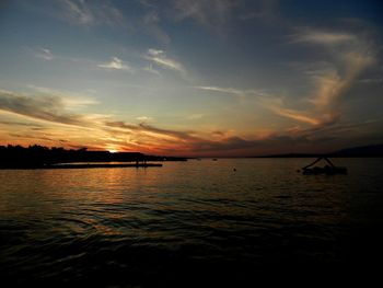 Scenic view of sea against sky at night