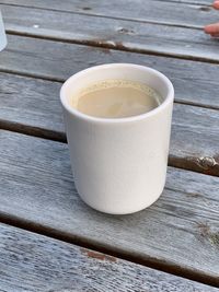 High angle view of coffee cup on table