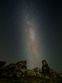 Low angle view of star field against sky at night