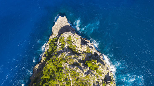 High angle view of island amidst sea