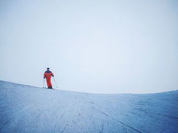 Rear view of man standing on landscape