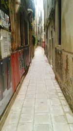 Narrow alley along buildings