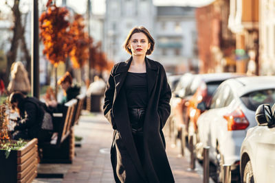 Woman standing in a city