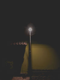 Illuminated street light at night