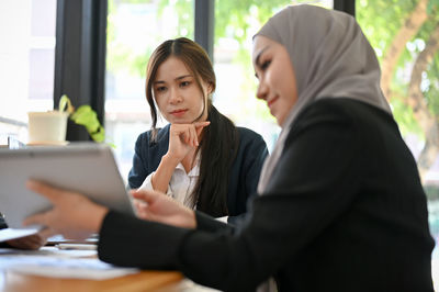 Young woman using mobile phone