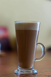 Close-up of coffee cup on table