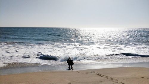 Scenic view of sea against clear sky