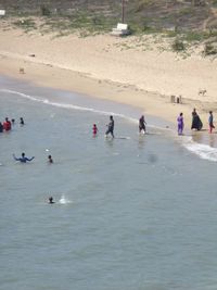 People enjoying on beach