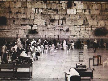 Group of people sitting in restaurant
