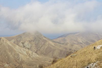 Scenic view of mountains against sky