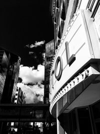 Low angle view of information sign in city