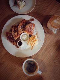 High angle view of breakfast served on table