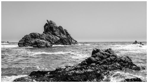 Scenic view of sea against clear sky