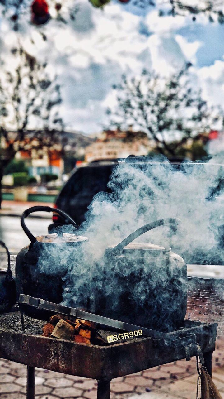 CLOSE-UP OF MEAT ON BARBECUE