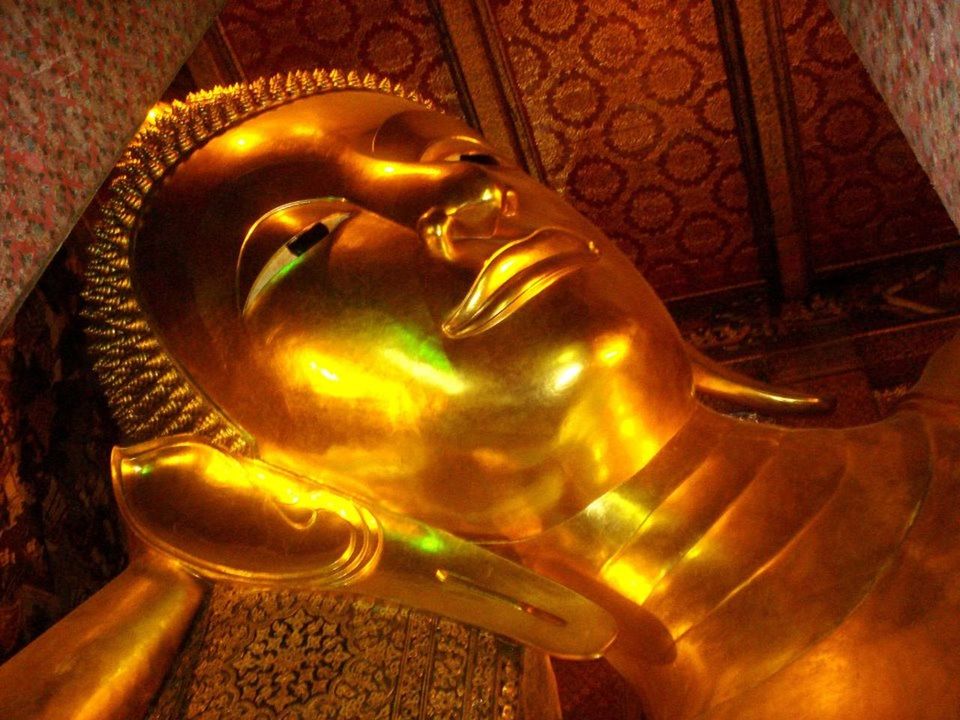 LOW ANGLE VIEW OF BUDDHA STATUE