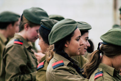 Side view portrait of woman wearing hat