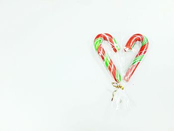 Close-up of heart shape over white background