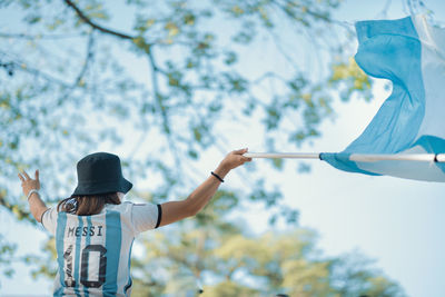 Woman celebrating football argentina victory world cup 2022
