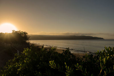 Scenic view of sea against sky during sunset