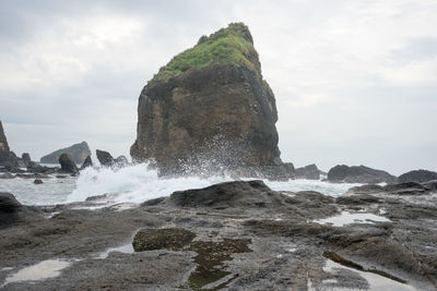 Waves splashing on beach