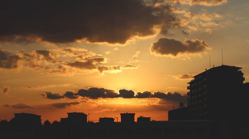 Silhouette of buildings at sunset
