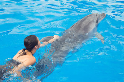 Woman swimming in pool