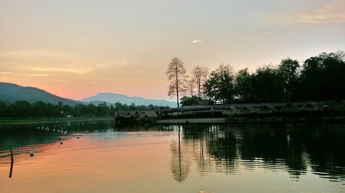 Scenic view of lake at sunset