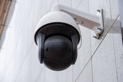 Video surveillance - surveillance camera on the wall of an office building