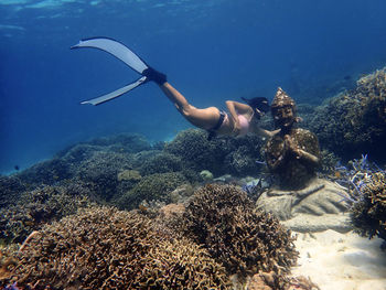 Man swimming in sea