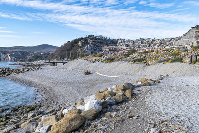 Scenic view of rocks against sky