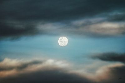 Low angle view of moon against sky